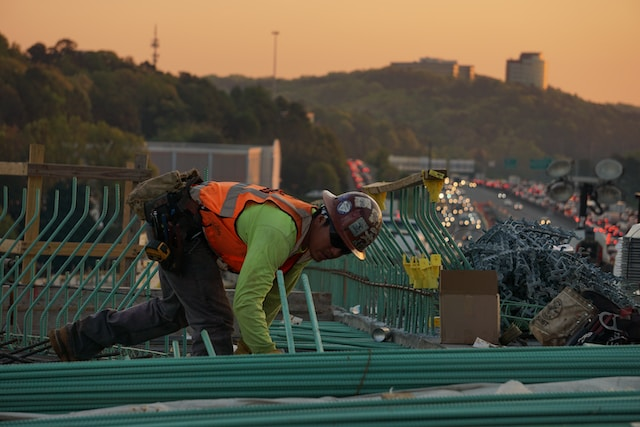 An individual reading a roofing report