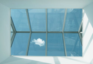 A ceiling skylight allowing sunlight to fill the room, enhancing the space with natural light.