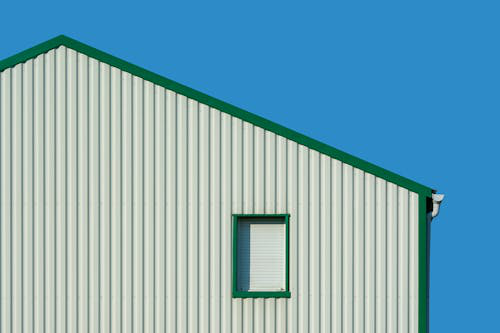 A well-integrated gutter system matching the roof, ensuring efficient drainage and a polished exterior look.