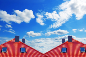 Eco-friendly red roofs made with energy-efficient materials on homes in New York.